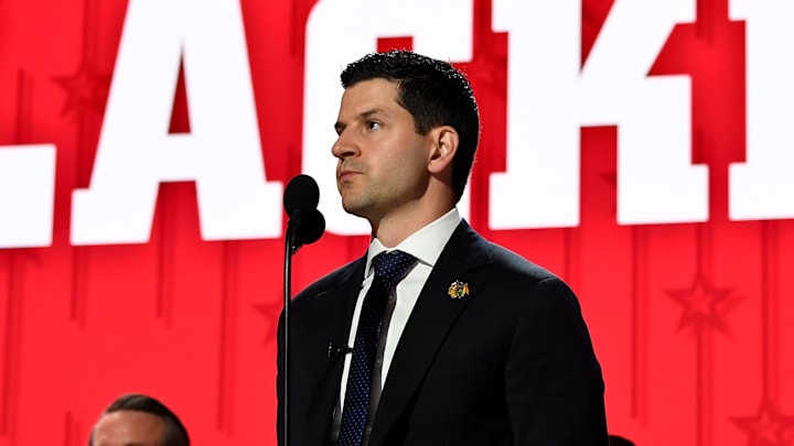 Jun 28, 2023; Nashville, Tennessee, USA; Chicago Blackhawks general manager Kyle Davidson makes the nineteenth pick in round one of the 2023 NHL Draft at Bridgestone Arena. Mandatory Credit: Christopher Hanewinckel-Imagn Images