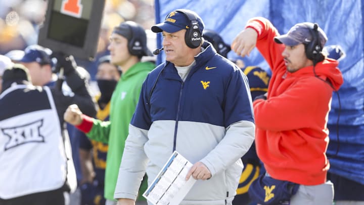 Nov 29, 2025; Morgantown, West Virginia, USA; West Virginia Mountaineers head coach Rich Rodriguez walks along the sidelines during the first quarter against the Texas Tech Red Raiders at Milan Puskar Stadium. Mandatory Credit: Ben Queen-Imagn Images