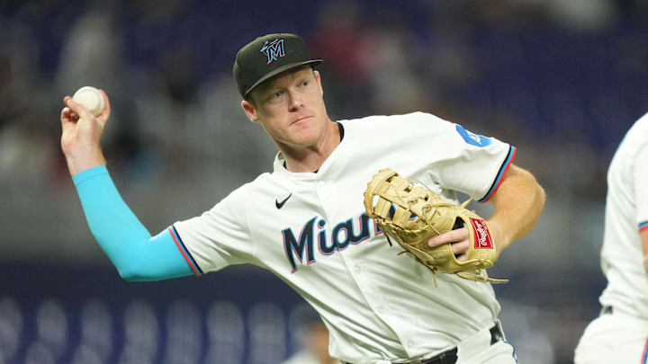 Miami Marlins first baseman Eric Wagaman (33) throws out St. Louis Cardinals center fielder Nathan Church (27) in the fifth inning at loanDepot Park. 