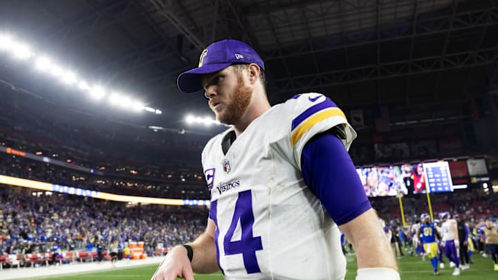 Jan 13, 2025; Glendale, AZ, USA; Minnesota Vikings quarterback Sam Darnold (14) reacts as he walks off the field after losing to the Los Angeles Rams during an NFC wild card game at State Farm Stadium. Mandatory Credit: Mark J. Rebilas-Imagn Images Jan 13, 2025; Glendale, AZ, USA; Minnesota Vikings quarterback Sam Darnold (14) reacts as he walks off the field after losing to the Los Angeles Rams during an NFC wild card game at State Farm Stadium. Mandatory Credit: Mark J. Rebilas-Imagn Images