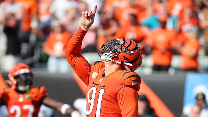 Sep 14, 2025; Cincinnati, Ohio, USA;  Cincinnati Bengals defensive end Trey Hendrickson (91) celebrates his sack during the fourth quarter against the Jacksonville Jaguars at Paycor Stadium. Mandatory Credit: Joseph Maiorana-Imagn Images