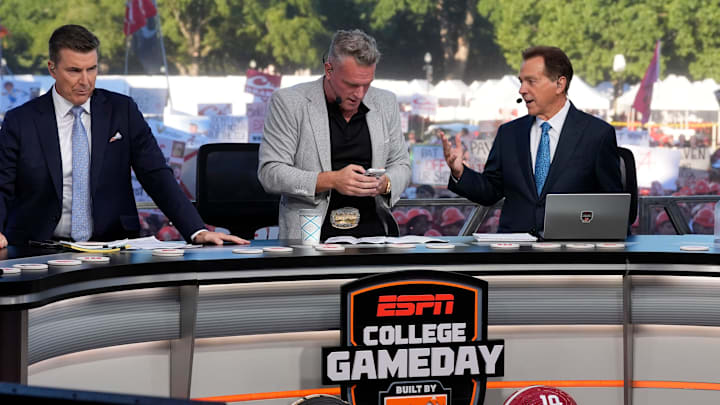 Oct. 4, 2025; Tuscaloosa, Alabama, USA; Rece Davis, Pat McAfee and Nick Saban interact on the set of ESPN’s College GameDay on location on the Quad at the University of Alabama before the Alabama versus Vanderbilt game.