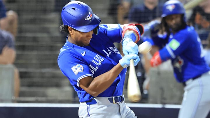 Mar 11, 2026; Tampa, Florida, USA;  Toronto Blue Jays infielder Arjun Nimmala (18) singles during the fifth inning against the New York Yankees at George M. Steinbrenner Field. Mandatory Credit: Kim Klement Neitzel-Imagn Images