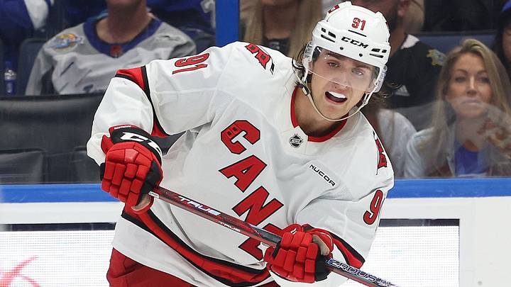 Sep 24, 2024; Tampa, Florida, USA; Carolina Hurricanes defenseman Ronan Seeley (91) passes the puck against the Tampa Bay Lightning during the third period at Amalie Arena. Mandatory Credit: Kim Klement Neitzel-Imagn Images