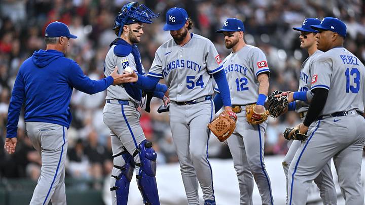 Kansas City Royals pitcher Mitch Spence is relieved during game versus the Chicago White Sox at Rate Field.