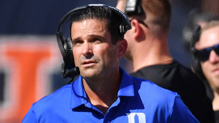 Sep 12, 2026; Champaign, Illinois, USA;  Duke Blue Devils head coach Manny Diaz, left, on the sidelines against the Illinois Fighting Illini during the first half at Gies Memorial Stadium.  Mandatory Credit: Ron Johnson-Imagn Images