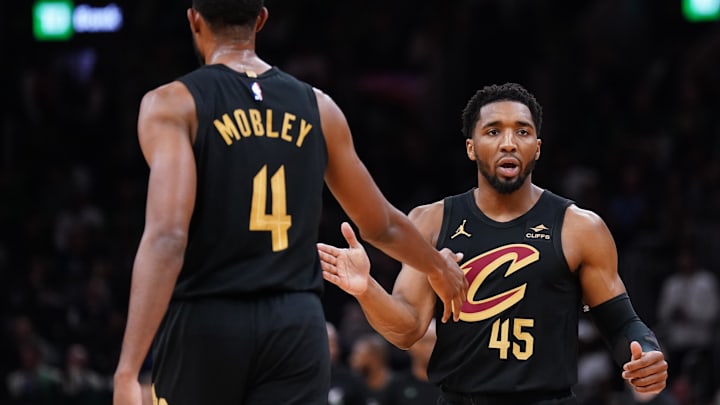 May 9, 2024; Boston, Massachusetts, USA; Cleveland Cavaliers guard Donovan Mitchell (45) reacts after a basket buy forward Evan Mobley (4) against the Boston Celtics in the first quarter during game two of the second round for the 2024 NBA playoffs at TD Garden. Mandatory Credit: David Butler II-Imagn Images