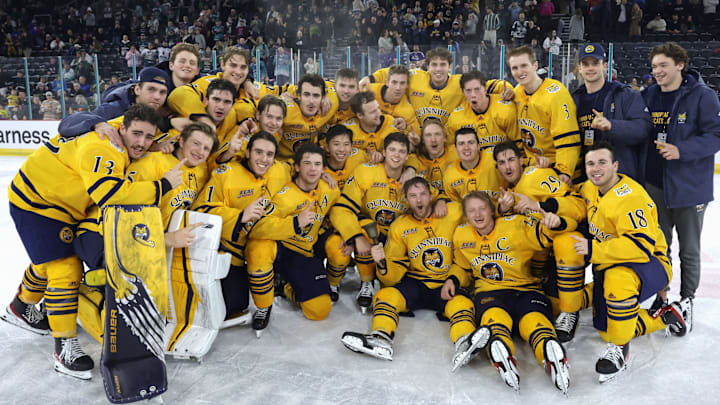 The Quinnipiac men's hockey team celebrates winning the Belpot Trophy at the 2022 Friendship Four in Belfast, Ireland. The Quinnipiac men's hockey team celebrates winning the Belpot Trophy at the 2022 Friendship Four in Belfast, Ireland.
