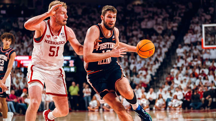 Illinois center Tomislav Ivisic drives on Nebraska center Rienk Mast in the Illini's 78-69 win over the Cornhuskers last Sunday at Pinnacle Bank Arena in Lincoln, Nebraska.