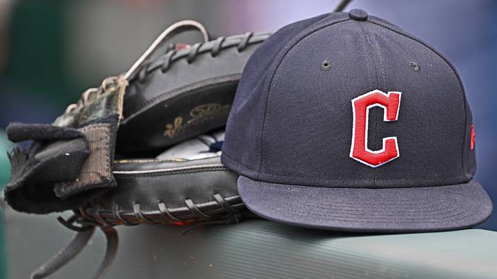 Jun 27, 2024; Kansas City, Missouri, USA; A general view a Cleveland Guardians hat and glove on the dugout railing before a game against the Kansas City Royals at Kauffman Stadium. Jun 27, 2024; Kansas City, Missouri, USA; A general view a Cleveland Guardians hat and glove on the dugout railing before a game against the Kansas City Royals at Kauffman Stadium.