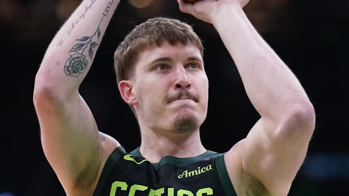 Mar 6, 2025; Boston, Massachusetts, USA; Boston Celtics forward Baylor Scheierman (55) shoots a free-throw. Against them Philadelphia 76ers in the second half at TD Garden. Mandatory Credit: David Butler II-Imagn Images Mar 6, 2025; Boston, Massachusetts, USA; Boston Celtics forward Baylor Scheierman (55) shoots a free-throw. Against them Philadelphia 76ers in the second half at TD Garden. Mandatory Credit: David Butler II-Imagn Images