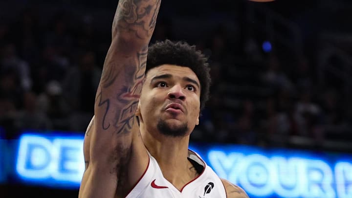Dec 21, 2024; Orlando, Florida, USA;Miami Heat center Kel'el Ware (7) dunks the ball against the Orlando Magic in the first quarter at Kia Center. Mandatory Credit: Nathan Ray Seebeck-Imagn Images