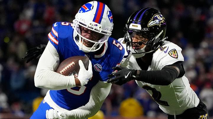 Buffalo Bills wide receiver Joshua Palmer runs the ball against Baltimore Ravens cornerback Nate Wiggins. Buffalo Bills wide receiver Joshua Palmer runs the ball against Baltimore Ravens cornerback Nate Wiggins.