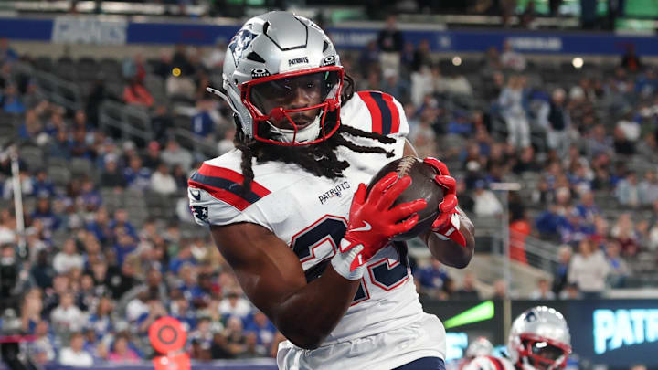 Aug 21, 2025; East Rutherford, New Jersey, USA; New England Patriots safety Kyle Dugger (23) interception a pass in the end zone during the first half against the New York Giants at MetLife Stadium. Mandatory Credit: Vincent Carchietta-Imagn Images