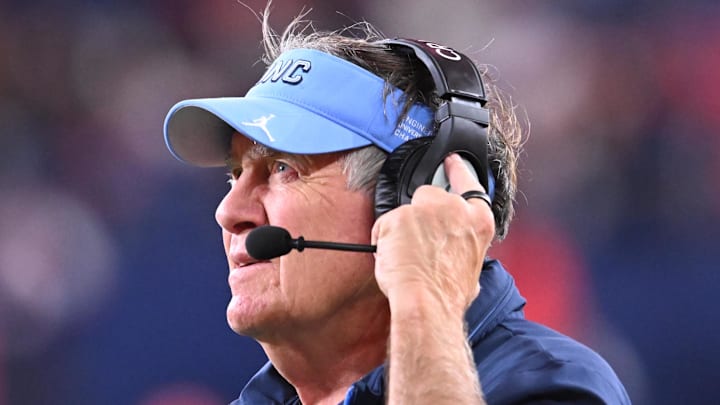 Oct 31, 2025; Syracuse, New York, USA; North Carolina Tar Heels head coach Bill Belichick looks to the clock in the fourth quarter game against the Syracuse Orange at the JMA Wireless Dome. Mandatory Credit: Mark Konezny-Imagn Images Oct 31, 2025; Syracuse, New York, USA; North Carolina Tar Heels head coach Bill Belichick looks to the clock in the fourth quarter game against the Syracuse Orange at the JMA Wireless Dome. Mandatory Credit: Mark Konezny-Imagn Images