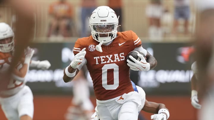 Texas Longhorns wide receiver DeAndre Moore Jr. runs for yards after making a reception during the first half against the San Jose State Spartans at Darrell K Royal-Texas Memorial Stadium.