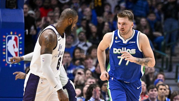 Dec 25, 2022; Dallas, Texas, USA; Los Angeles Lakers forward LeBron James (6) and Dallas Mavericks guard Luka Doncic (77) in action during the game between the Dallas Mavericks and the Los Angeles Lakers at American Airlines Center. Mandatory Credit: Jerome Miron-Imagn Images