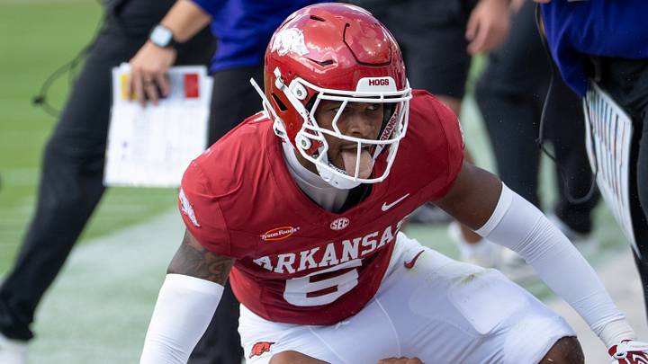 Arkansas Razorbacks nickelback Khmori House celebrates after making tackle of North Alabama quarterback Destin Wade.