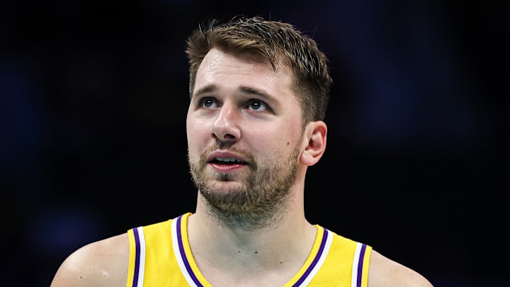 Luka Doncic looks up before taking a free throw