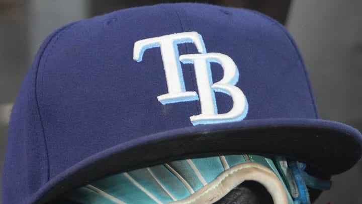 Sep 26, 2025; Toronto, Ontario, CAN; The hat and glove of Tampa Bay Rays third baseman Junior Caminero (13) in the dugout during the game against the Toronto Blue Jays at Rogers Centre. Sep 26, 2025; Toronto, Ontario, CAN; The hat and glove of Tampa Bay Rays third baseman Junior Caminero (13) in the dugout during the game against the Toronto Blue Jays at Rogers Centre.