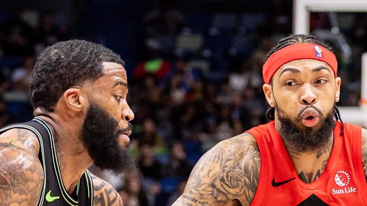 Toronto Raptors forward Brandon Ingram dribbles against New Orleans Pelicans guard/forward Saddiq Bey.