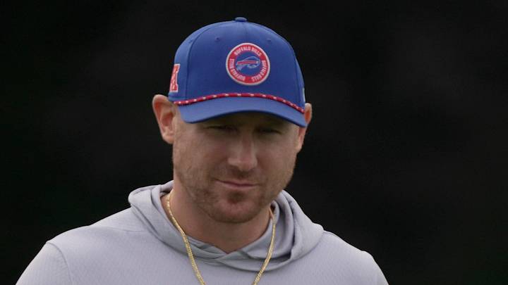 Bills head coach Joe Brady walks among the players as they stretch before practice Bills Training Camp at St. John Fisher University in Pittsford on Aug. 1, 2026.
