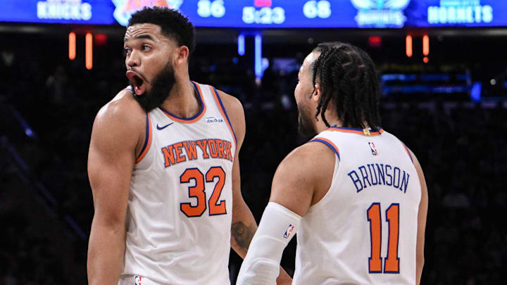 Dec 5, 2024; New York, New York, USA; New York Knicks center Karl-Anthony Towns (32) and New York Knicks guard Jalen Brunson (11) react during the second half against the Charlotte Hornets at Madison Square Garden. Mandatory Credit: John Jones-Imagn Images