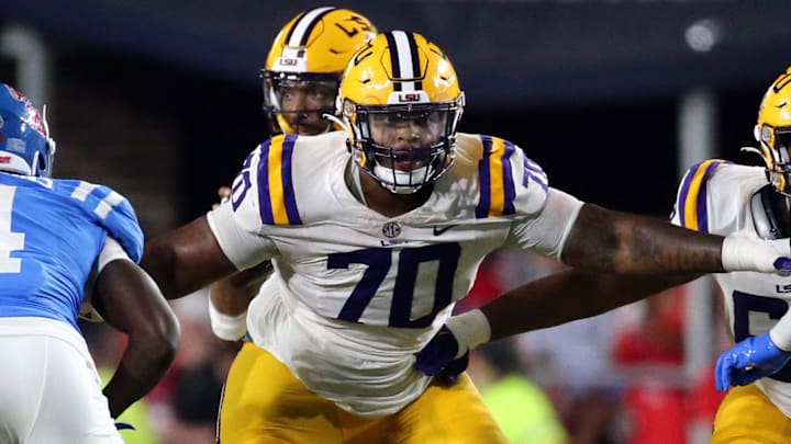Sep 30, 2023; Oxford, Mississippi, USA; LSU Tigers offensive lineman Miles Frazier (70) blocks during the second half against the Mississippi Rebels at Vaught-Hemingway Stadium. Mandatory Credit: Petre Thomas-Imagn Images Sep 30, 2023; Oxford, Mississippi, USA; LSU Tigers offensive lineman Miles Frazier (70) blocks during the second half against the Mississippi Rebels at Vaught-Hemingway Stadium. Mandatory Credit: Petre Thomas-Imagn Images