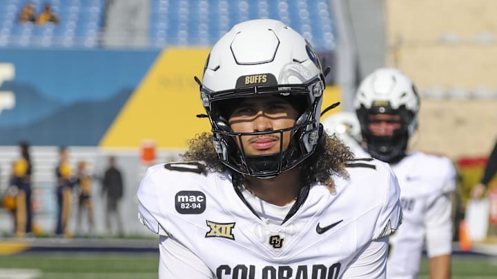 Nov 8, 2025; Morgantown, West Virginia, USA; Colorado Buffaloes quarterback Julian Lewis (10) warms up prior to their game against the West Virginia Mountaineers at Milan Puskar Stadium. 