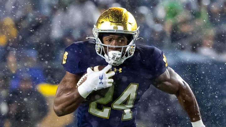 Notre Dame Fighting Irish running back Jadarian Price (24) runs against the Navy Midshipmen at Notre Dame Stadium. 