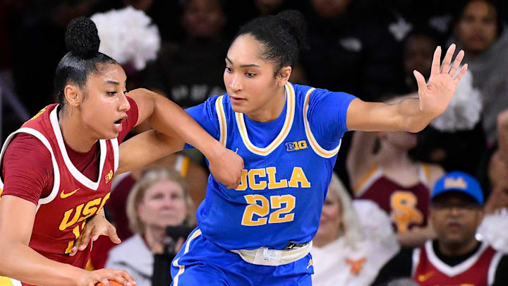Feb 13, 2025; Los Angeles, California, USA; USC Trojans guard JuJu Watkins (12) and UCLA Bruins forward Kendall Dudley (22) during an NCAA basketball game at Galen Center. Mandatory Credit: Robert Hanashiro-Imagn Images Feb 13, 2025; Los Angeles, California, USA; USC Trojans guard JuJu Watkins (12) and UCLA Bruins forward Kendall Dudley (22) during an NCAA basketball game at Galen Center. Mandatory Credit: Robert Hanashiro-Imagn Images