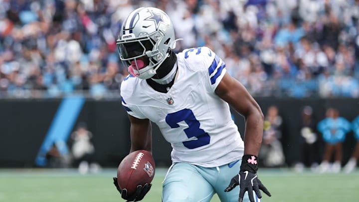 Dallas Cowboys wide receiver George Pickens runs with the ball during the first quarter against the Carolina Panthers at Bank of America Stadium. 