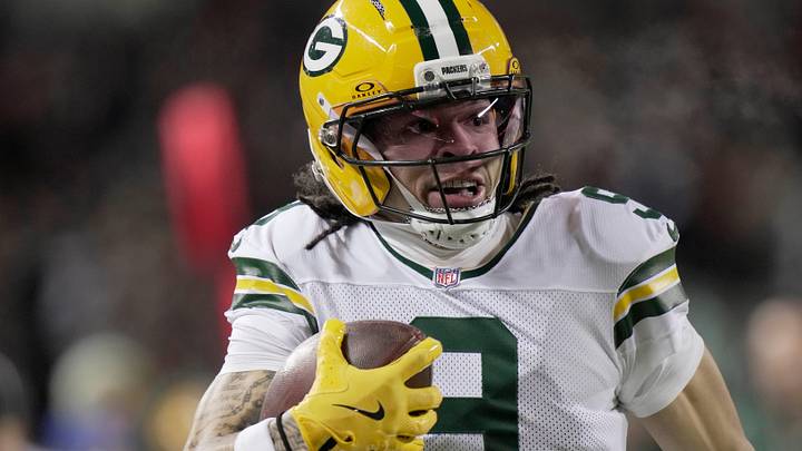 Green Bay Packers receiver Christian Watson runs after the catch against the Bears.