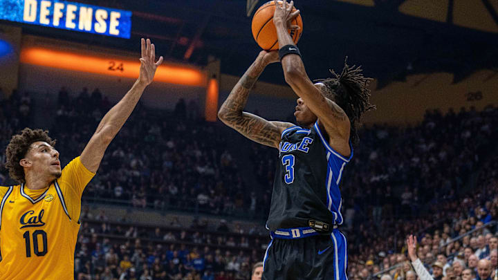 Jan 14, 2026; Berkeley, California, USA; Duke Blue Devils guard Isaiah Evans (3) makes a three point shot against California Golden Bears guard Justin Pippen (10) during the first half at Haas Pavilion. Mandatory Credit: Neville E. Guard-Imagn Images