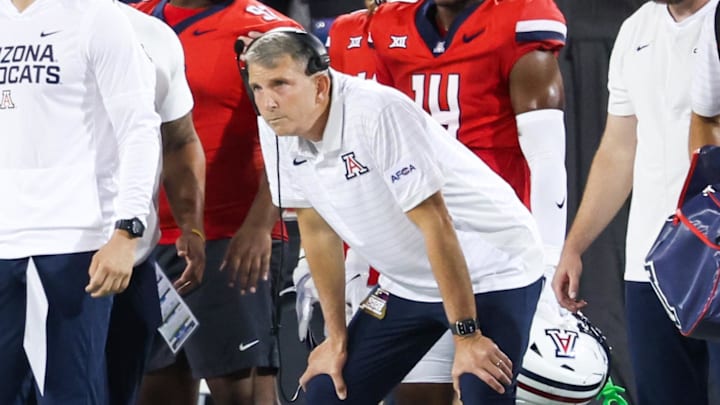 Sep 6, 2025; Tucson, Arizona, USA; Arizona Wildcats head coach Brent Brennan watches from the sidelines during the first quarter of the game against the Weber State Wildcats at Arizona Stadium. Mandatory Credit: Aryanna Frank-Imagn Images Sep 6, 2025; Tucson, Arizona, USA; Arizona Wildcats head coach Brent Brennan watches from the sidelines during the first quarter of the game against the Weber State Wildcats at Arizona Stadium. Mandatory Credit: Aryanna Frank-Imagn Images