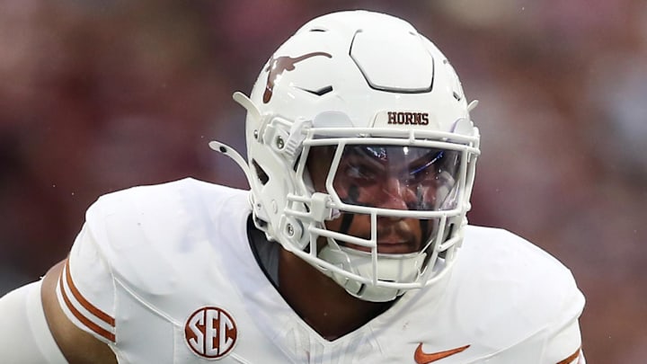 Oct 25, 2025; Starkville, Mississippi, USA; Texas Longhorns linebacker Trey Moore (8) attempts to get into the backfield during the second quarter against the Mississippi State Bulldogs at Davis Wade Stadium at Scott Field. Mandatory Credit: Petre Thomas-Imagn Images