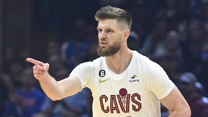 Apr 9, 2023; Cleveland, Ohio, USA; Cleveland Cavaliers forward Dean Wade (32) celebrates his three-point basket in the first quarter against the Charlotte Hornets at Rocket Mortgage FieldHouse. Mandatory Credit: David Richard-Imagn Images