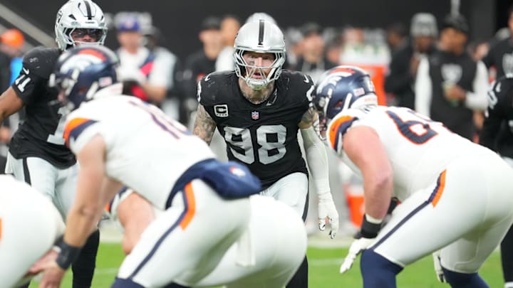 Dec 7, 2025; Paradise, Nevada, USA;  Las Vegas Raiders defensive end Maxx Crosby (98) sets his sights on Denver Broncos quarterback Bo Nix (10) during the first half at Allegiant Stadium. Mandatory Credit: Stephen R. Sylvanie-Imagn Images