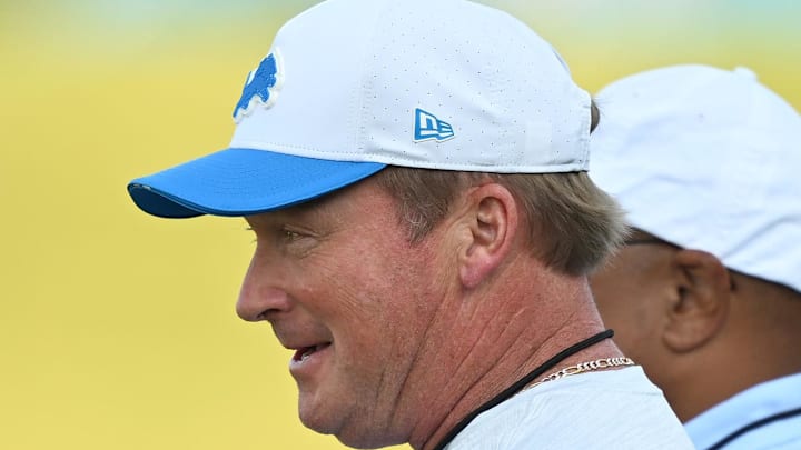 Jon Gruden watches the Detroit Lions. Jon Gruden watches the Detroit Lions.