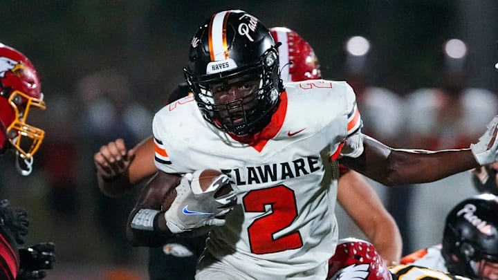 Sep 13, 2024; Sunbury, Ohio, USA; Delaware Hayes Favour Akih (2) runs the ball against Big Walnut in the second half at Big Walnut High School.