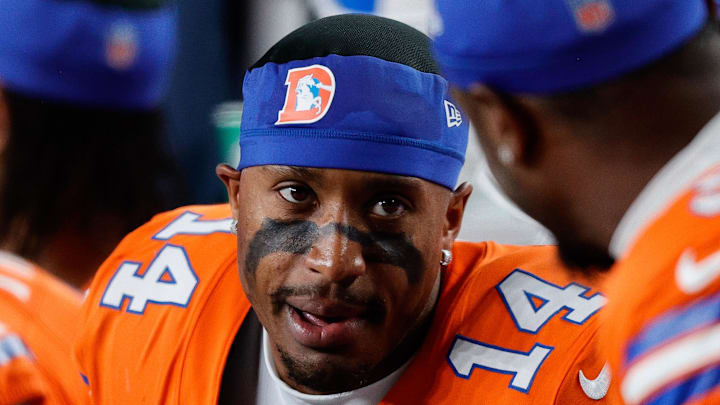 Nov 6, 2025; Denver, Colorado, USA; Denver Broncos wide receiver Courtland Sutton (14) on the bench in the fourth quarter against the Las Vegas Raiders at Empower Field at Mile High. Mandatory Credit: Isaiah J. Downing-Imagn Images