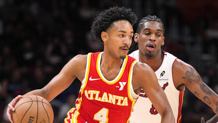 Oct 16, 2024; Miami, Florida, USA; Atlanta Hawks guard Kobe Bufkin (4) brings the ball up the court against the Miami Heat in the second half at Kaseya Center. Mandatory Credit: Jim Rassol-Imagn Images