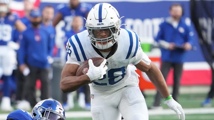 Dec 29, 2024; East Rutherford, New Jersey, USA; Indianapolis Colts running back Jonathan Taylor (28) runs past New York Giants safety Jason Pinnock (27) during the first half at MetLife Stadium. Mandatory Credit: Robert Deutsch-Imagn Images Dec 29, 2024; East Rutherford, New Jersey, USA; Indianapolis Colts running back Jonathan Taylor (28) runs past New York Giants safety Jason Pinnock (27) during the first half at MetLife Stadium. Mandatory Credit: Robert Deutsch-Imagn Images