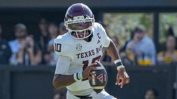 Texas A&M Aggies quarterback Marcel Reed (10) scrambles in the backfield against the Missouri Tigers during the second half of the game at Faurot Field at Memorial Stadium