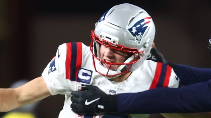 Feb 8, 2026; Santa Clara, CA, USA; New England Patriots quarterback Drake Maye (10) runs against Seattle Seahawks linebacker Ernest Jones IV (13) during the third quarter in Super Bowl LX at Levi's Stadium. Mandatory Credit: Mark J. Rebilas-Imagn Images