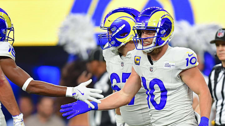 Oct 24, 2024; Inglewood, California, USA; Los Angeles Rams wide receiver Cooper Kupp (10) celebrates his touchdown scored against the Minnesota Vikings with wide receiver Demarcus Robinson (15) during the first half at SoFi Stadium. Mandatory Credit: Gary A. Vasquez-Imagn Images