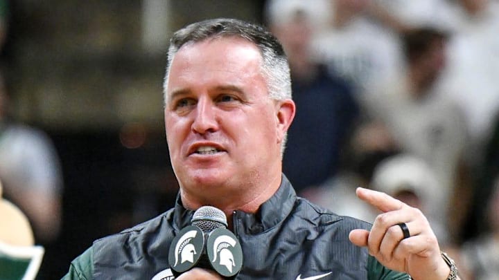 Michigan State's new football coach Pat Fitzgerald addresses the crowd during a timeout in the first half of the Spartans basketball game against Iowa on Tuesday, Dec. 2, 2025, at the Breslin Center in East Lansing.