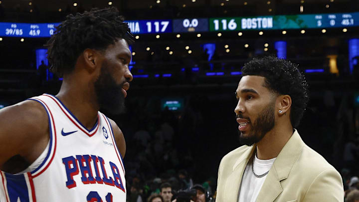 Oct 22, 2025; Boston, Massachusetts, USA; Philadelphia 76ers center Joel Embiid (21) talks with Boston Celtics forward Jayson Tatum (0) after their game at TD Garden. Mandatory Credit: Winslow Townson-Imagn Images Oct 22, 2025; Boston, Massachusetts, USA; Philadelphia 76ers center Joel Embiid (21) talks with Boston Celtics forward Jayson Tatum (0) after their game at TD Garden. Mandatory Credit: Winslow Townson-Imagn Images