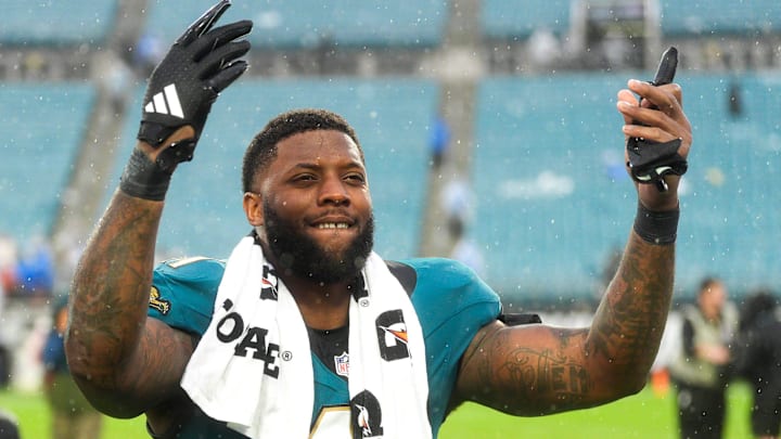 Jacksonville Jaguars defensive end Josh Hines-Allen (41) celebrates as he runs off the field after defeating the Colts during an NFL football game at EverBank Stadium, Sunday, Dec. 7, 2025, in Jacksonville, Fla. Jaguars won 36-19[Doug Engle/Florida Times-Union]