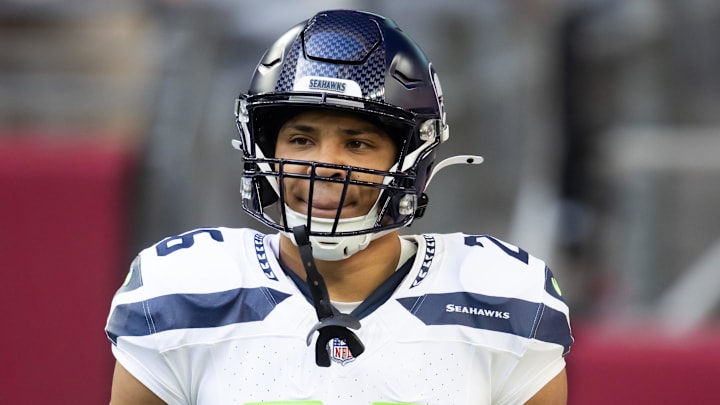 Dec 8, 2024; Glendale, Arizona, USA; Seattle Seahawks running back Zach Charbonnet (26) against the Arizona Cardinals at State Farm Stadium. Mandatory Credit: Mark J. Rebilas-Imagn Images Dec 8, 2024; Glendale, Arizona, USA; Seattle Seahawks running back Zach Charbonnet (26) against the Arizona Cardinals at State Farm Stadium. Mandatory Credit: Mark J. Rebilas-Imagn Images